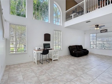 Stunning 5-Bedroom Pool Home on Expansive Corner Lot with Water on Oaks National Golf Course in Florida - for sale on GolfHomes.com, golf home, golf lot
