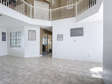 Stunning 5-Bedroom Pool Home on Expansive Corner Lot with Water on Oaks National Golf Course in Florida - for sale on GolfHomes.com, golf home, golf lot