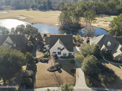 This beautiful brick home is all about the views.  Sit on the on Carolina National Golf Club in North Carolina - for sale on GolfHomes.com, golf home, golf lot