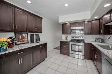 Welcome Home to Unit 52 in The Flamenco, Building 79! Step into on On Top Of The World Golf Course in Florida - for sale on GolfHomes.com, golf home, golf lot