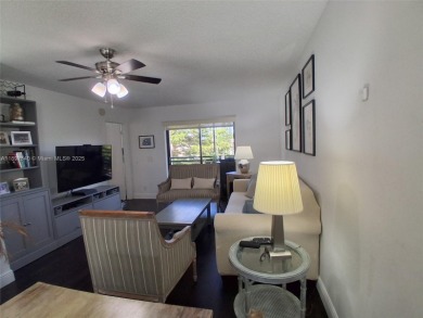 MUST SEE! Beautiful completely remodeled penthouse 2/2 condo in on Sunrise Lakes Phase IV Golf Course in Florida - for sale on GolfHomes.com, golf home, golf lot