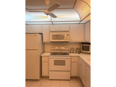 Lovely and well maintained, extended FIRST FLOOR 1/1.5 unit with on Sunrise Lakes Phase III in Florida - for sale on GolfHomes.com, golf home, golf lot