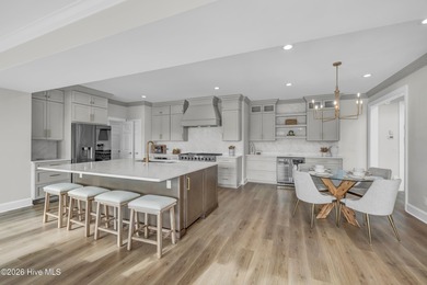 Commanding exceptional Intracoastal Waterway and golf course on Country Club of Landfall in North Carolina - for sale on GolfHomes.com, golf home, golf lot