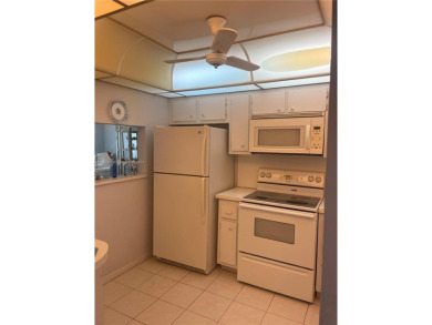 Lovely and well maintained, extended FIRST FLOOR 1/1.5 unit with on Sunrise Lakes Phase III in Florida - for sale on GolfHomes.com, golf home, golf lot