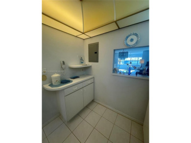 Lovely and well maintained, extended FIRST FLOOR 1/1.5 unit with on Sunrise Lakes Phase III in Florida - for sale on GolfHomes.com, golf home, golf lot