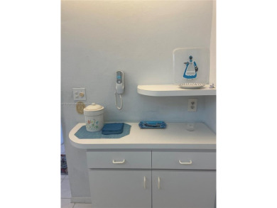 Lovely and well maintained, extended FIRST FLOOR 1/1.5 unit with on Sunrise Lakes Phase III in Florida - for sale on GolfHomes.com, golf home, golf lot