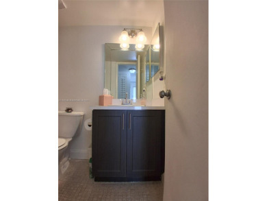 MUST SEE! Beautiful completely remodeled penthouse 2/2 condo in on Sunrise Lakes Phase IV Golf Course in Florida - for sale on GolfHomes.com, golf home, golf lot