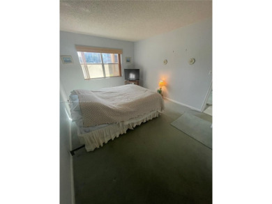 Lovely and well maintained, extended FIRST FLOOR 1/1.5 unit with on Sunrise Lakes Phase III in Florida - for sale on GolfHomes.com, golf home, golf lot