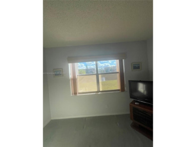 Lovely and well maintained, extended FIRST FLOOR 1/1.5 unit with on Sunrise Lakes Phase III in Florida - for sale on GolfHomes.com, golf home, golf lot