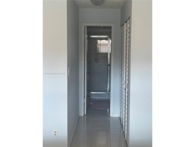 Lovely and well maintained, extended FIRST FLOOR 1/1.5 unit with on Sunrise Lakes Phase III in Florida - for sale on GolfHomes.com, golf home, golf lot