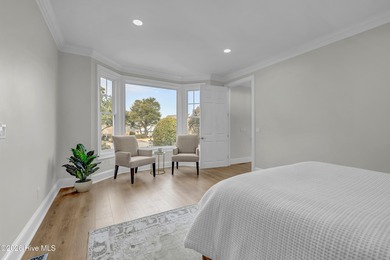 Commanding exceptional Intracoastal Waterway and golf course on Country Club of Landfall in North Carolina - for sale on GolfHomes.com, golf home, golf lot