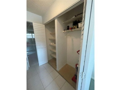 Lovely and well maintained, extended FIRST FLOOR 1/1.5 unit with on Sunrise Lakes Phase III in Florida - for sale on GolfHomes.com, golf home, golf lot
