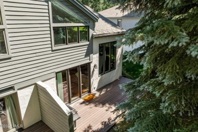 This thoughtfully updated 4-bedroom, 3-bath duplex offers a on Eagle Vail Golf Course in Colorado - for sale on GolfHomes.com, golf home, golf lot