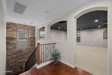 This expansive 5-bedroom, 3-bath home offers over 4,100 square on The Golf Club At Johnson Ranch in Arizona - for sale on GolfHomes.com, golf home, golf lot