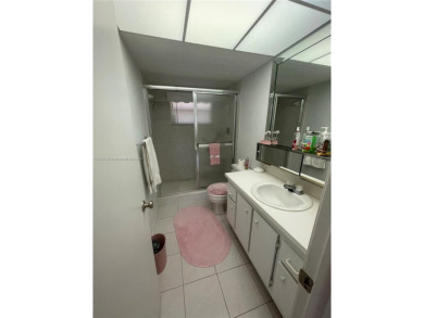 Lovely and well maintained, extended FIRST FLOOR 1/1.5 unit with on Sunrise Lakes Phase III in Florida - for sale on GolfHomes.com, golf home, golf lot
