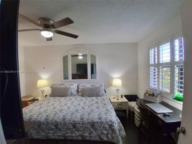 MUST SEE! Beautiful completely remodeled penthouse 2/2 condo in on Sunrise Lakes Phase IV Golf Course in Florida - for sale on GolfHomes.com, golf home, golf lot