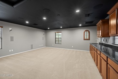 This expansive 5-bedroom, 3-bath home offers over 4,100 square on The Golf Club At Johnson Ranch in Arizona - for sale on GolfHomes.com, golf home, golf lot
