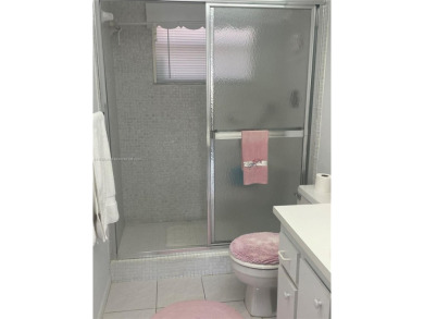 Lovely and well maintained, extended FIRST FLOOR 1/1.5 unit with on Sunrise Lakes Phase III in Florida - for sale on GolfHomes.com, golf home, golf lot
