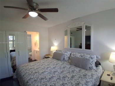 MUST SEE! Beautiful completely remodeled penthouse 2/2 condo in on Sunrise Lakes Phase IV Golf Course in Florida - for sale on GolfHomes.com, golf home, golf lot