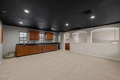This expansive 5-bedroom, 3-bath home offers over 4,100 square on The Golf Club At Johnson Ranch in Arizona - for sale on GolfHomes.com, golf home, golf lot