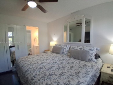 MUST SEE! Beautiful completely remodeled penthouse 2/2 condo in on Sunrise Lakes Phase IV Golf Course in Florida - for sale on GolfHomes.com, golf home, golf lot