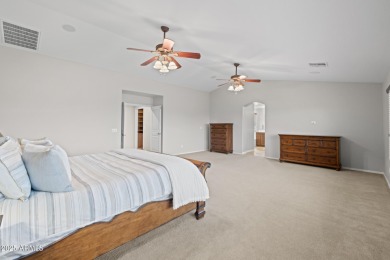This expansive 5-bedroom, 3-bath home offers over 4,100 square on The Golf Club At Johnson Ranch in Arizona - for sale on GolfHomes.com, golf home, golf lot