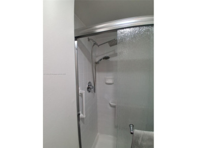 MUST SEE! Beautiful completely remodeled penthouse 2/2 condo in on Sunrise Lakes Phase IV Golf Course in Florida - for sale on GolfHomes.com, golf home, golf lot