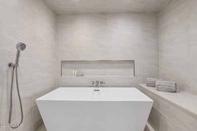 This thoughtfully updated 4-bedroom, 3-bath duplex offers a on Eagle Vail Golf Course in Colorado - for sale on GolfHomes.com, golf home, golf lot
