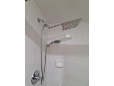 MUST SEE! Beautiful completely remodeled penthouse 2/2 condo in on Sunrise Lakes Phase IV Golf Course in Florida - for sale on GolfHomes.com, golf home, golf lot