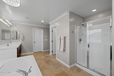 This expansive 5-bedroom, 3-bath home offers over 4,100 square on The Golf Club At Johnson Ranch in Arizona - for sale on GolfHomes.com, golf home, golf lot
