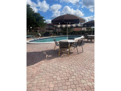 Lovely and well maintained, extended FIRST FLOOR 1/1.5 unit with on Sunrise Lakes Phase III in Florida - for sale on GolfHomes.com, golf home, golf lot