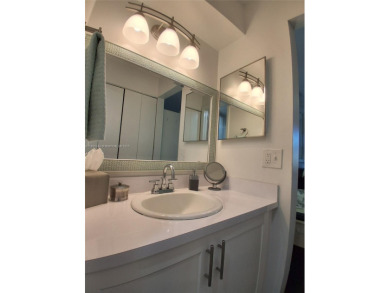 MUST SEE! Beautiful completely remodeled penthouse 2/2 condo in on Sunrise Lakes Phase IV Golf Course in Florida - for sale on GolfHomes.com, golf home, golf lot