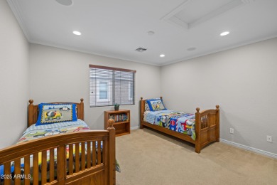 This expansive 5-bedroom, 3-bath home offers over 4,100 square on The Golf Club At Johnson Ranch in Arizona - for sale on GolfHomes.com, golf home, golf lot