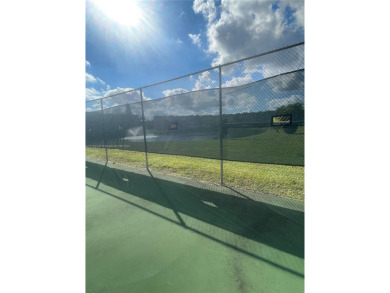 Lovely and well maintained, extended FIRST FLOOR 1/1.5 unit with on Sunrise Lakes Phase III in Florida - for sale on GolfHomes.com, golf home, golf lot