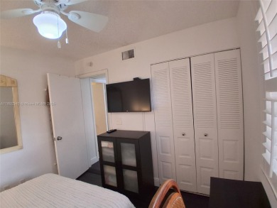 MUST SEE! Beautiful completely remodeled penthouse 2/2 condo in on Sunrise Lakes Phase IV Golf Course in Florida - for sale on GolfHomes.com, golf home, golf lot