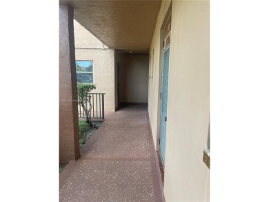 Lovely and well maintained, extended FIRST FLOOR 1/1.5 unit with on Sunrise Lakes Phase III in Florida - for sale on GolfHomes.com, golf home, golf lot