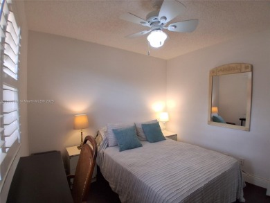 MUST SEE! Beautiful completely remodeled penthouse 2/2 condo in on Sunrise Lakes Phase IV Golf Course in Florida - for sale on GolfHomes.com, golf home, golf lot