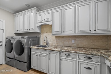 This expansive 5-bedroom, 3-bath home offers over 4,100 square on The Golf Club At Johnson Ranch in Arizona - for sale on GolfHomes.com, golf home, golf lot