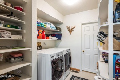 This thoughtfully updated 4-bedroom, 3-bath duplex offers a on Eagle Vail Golf Course in Colorado - for sale on GolfHomes.com, golf home, golf lot