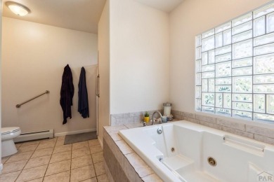 Welcome to this stunning 2-story home in Walking Stick Estates on Walking Stick Golf Course in Colorado - for sale on GolfHomes.com, golf home, golf lot