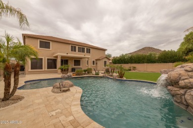 This expansive 5-bedroom, 3-bath home offers over 4,100 square on The Golf Club At Johnson Ranch in Arizona - for sale on GolfHomes.com, golf home, golf lot