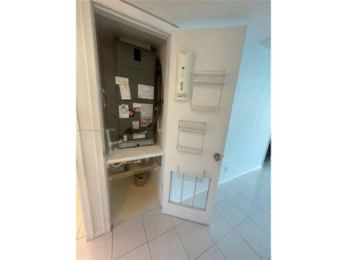 Lovely and well maintained, extended FIRST FLOOR 1/1.5 unit with on Sunrise Lakes Phase III in Florida - for sale on GolfHomes.com, golf home, golf lot