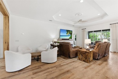 Tucked inside the gates of Boca Royale, this exceptional on Boca Royale Golf and Country Club in Florida - for sale on GolfHomes.com, golf home, golf lot