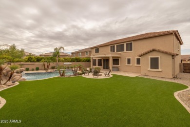 This expansive 5-bedroom, 3-bath home offers over 4,100 square on The Golf Club At Johnson Ranch in Arizona - for sale on GolfHomes.com, golf home, golf lot