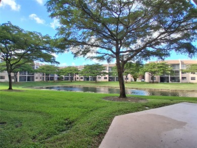 MUST SEE! Beautiful completely remodeled penthouse 2/2 condo in on Sunrise Lakes Phase IV Golf Course in Florida - for sale on GolfHomes.com, golf home, golf lot