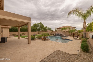 This expansive 5-bedroom, 3-bath home offers over 4,100 square on The Golf Club At Johnson Ranch in Arizona - for sale on GolfHomes.com, golf home, golf lot
