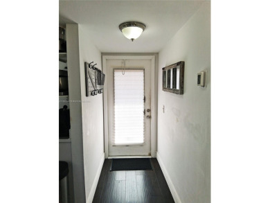 MUST SEE! Beautiful completely remodeled penthouse 2/2 condo in on Sunrise Lakes Phase IV Golf Course in Florida - for sale on GolfHomes.com, golf home, golf lot