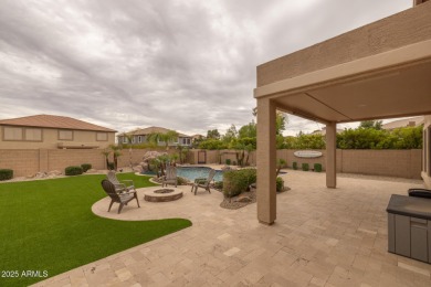 This expansive 5-bedroom, 3-bath home offers over 4,100 square on The Golf Club At Johnson Ranch in Arizona - for sale on GolfHomes.com, golf home, golf lot