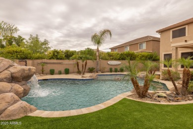 This expansive 5-bedroom, 3-bath home offers over 4,100 square on The Golf Club At Johnson Ranch in Arizona - for sale on GolfHomes.com, golf home, golf lot