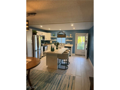 Golf View Manor Condo Naples, Beautiful 2nd floor unit with 2 on Eagle Creek Golf and Country Club in Florida - for sale on GolfHomes.com, golf home, golf lot